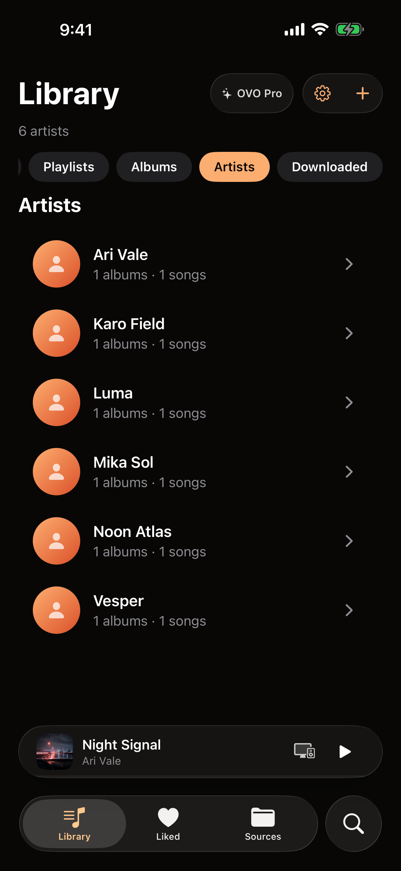 OVO on iPhone showing the Artists view, with album and song counts beside each artist.